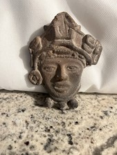 Weird Antique Face. No Clue