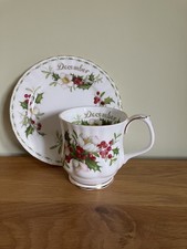 ROYAL ALBERT - FLOWER OF THE MONTH - DECEMBER - COFFEE MUG WITH SIDE PLATE
