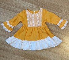 **STUNNING 6-9 MONTHS YELLOW FRILLY DRESS BOUTIQUE**