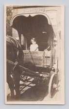 Old B&W Photo Girl riding in Wooden Cart with Horse
