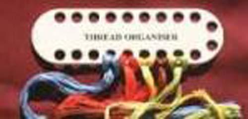 Plastic thread organiser for - thread,