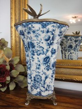 Porcelain bronze flower vase