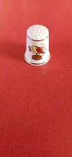 A China Thimble Showing Pictures Of Clowns And Was Manufactured By L.N.B. JONES.