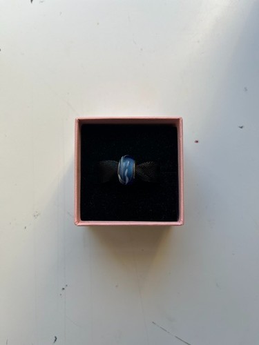 Pandora blue with white swirls