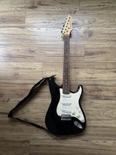 Johnson stratocaster style electric guitar - black - outstanding condition. 