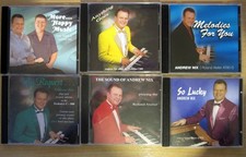 6 Andrew Nix CDs Playing
