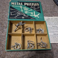 6 Vintage Metal Puzzles in a Box by H.P.G & S. Ltd.
