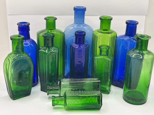 Old coloured glass bottles - old,