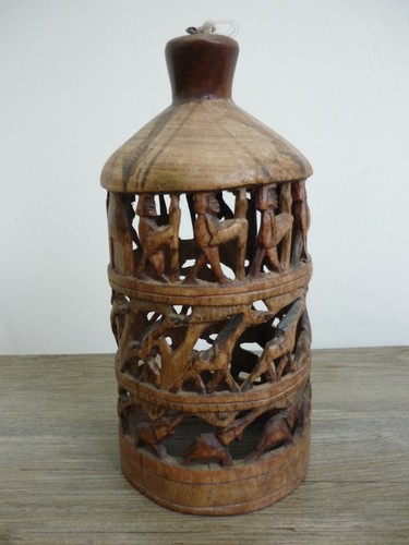 Hand carved ethnic art - carved, wooden
