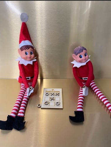 Naughty elf noughts - naughty, crosses