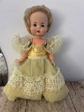 Vintage Dolls wearing bespoke