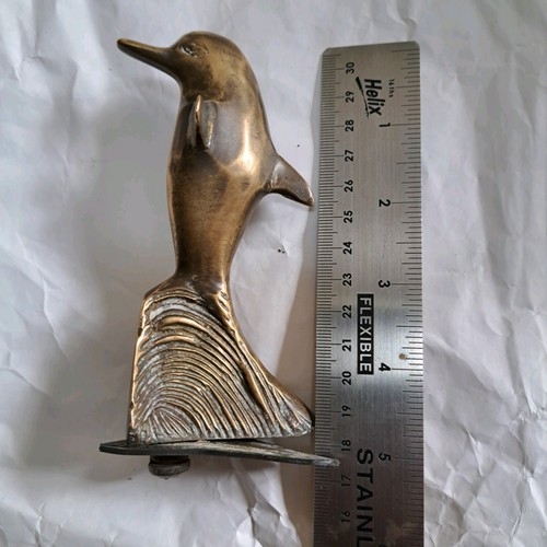 Classic car mascot dolphin