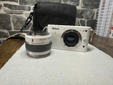 Nikon 1 J2 camera in carry