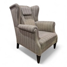 Wing back upholstered armchair