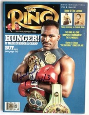 Evander Holyfield signed the