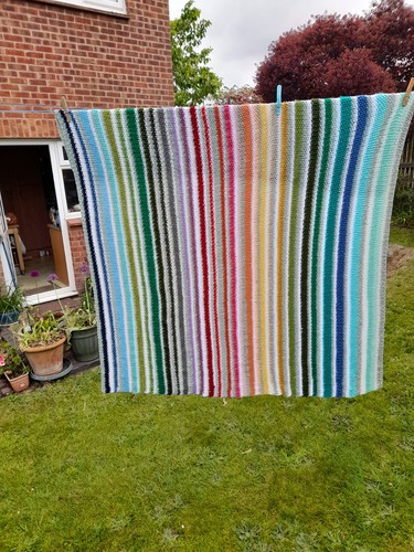 Striped knitted lap blanket