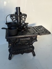 Vintage Reproduction of A Miniature Antique Cast Iron Range With Cast Iron Pans