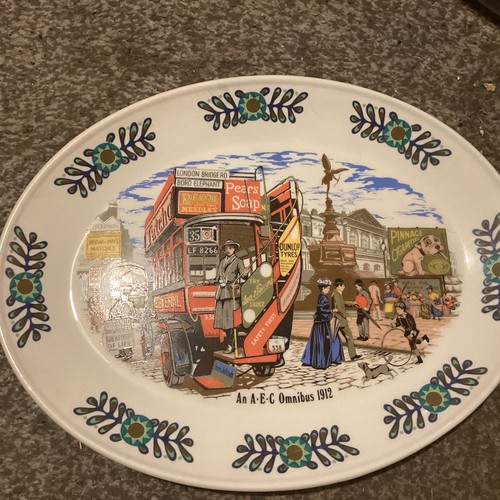 Oval plate depicting aec - depicting,
