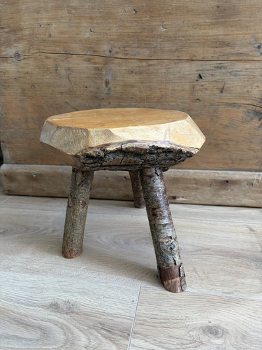 Rustic small wooden log stool