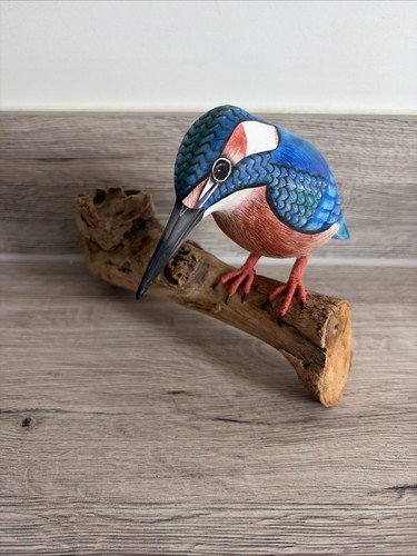 Hand carved wooden kingfisher - hand,