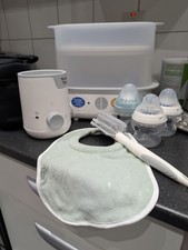 Tommee Tippee  Electric Steam Steriliser with complete 12 pieces feeding set 