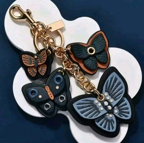 Coach butterfly cluster - coach,