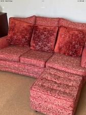 settee with foot stool. Old fashioned  but comfortable 