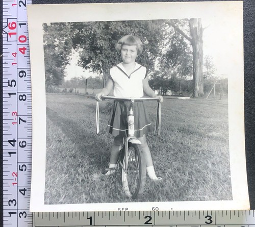 Little girl riding tricycle - riding,