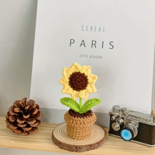 Hand knitted crochet sunflower - hand,