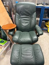 Stressless chair with footstool with side table