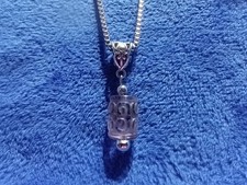 Carved Amethyst Barrel Pendant