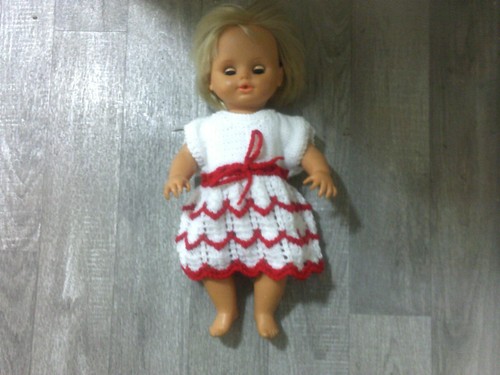 Hand knitted doll dress fits