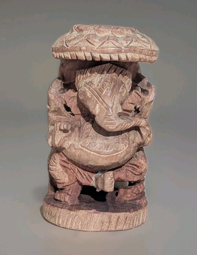 Hand carved wooden elephant - hand,