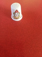 A Lovely Ceramic Bone China Thimble Which Depicts A Picture Of Suki The Clown.