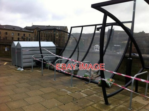 Photo damaged cycle shelter - , a