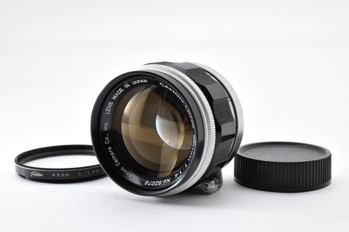 Near mint canon 50mm - mint],