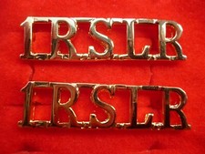 Pair metal shoulder titles - of,