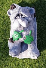 Bear Lying On A Log With Mouse