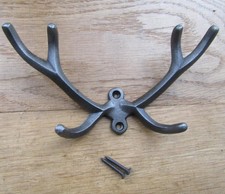 Rustic iron coat hook hallway