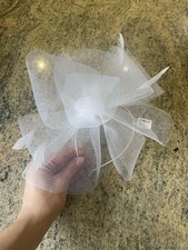 Claire’s White Feather