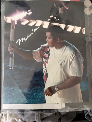 Ali passing torch signed - ali,