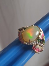 TJC Big Welo Ethiopian Opal  ring With Enamel Detail And Is In 925 Silver. P