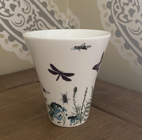 Ceramic tumbler with - m,