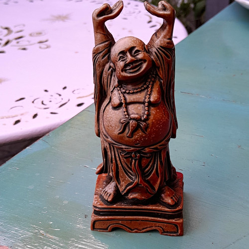 Carved laughing buddha - laughing,