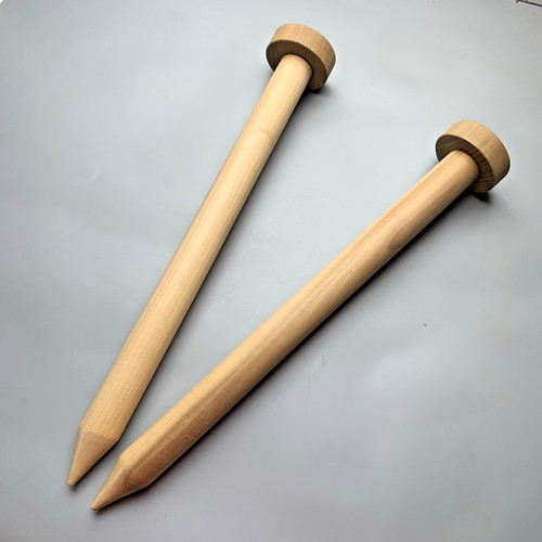 Wooden giant knitting - knitting, needles