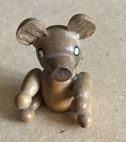 Small brown wooden animal - small,