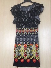 Pussycat London dress. Black dress with red and yellow design. Size S,size small