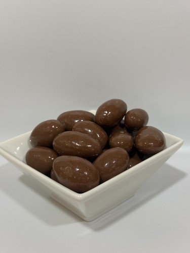 Milk chocolate coated - milk, covered