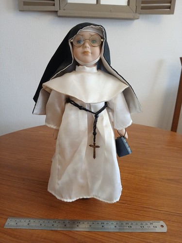 Porcelain doll nun - porcelain,