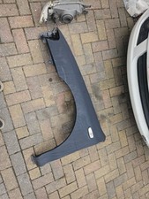 genuine Subaru Impreza both front wings unfinished black primer